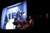 Juice Vocal Ensemble performing for Mira Calix at British Film Institute in Anna Chocola hats