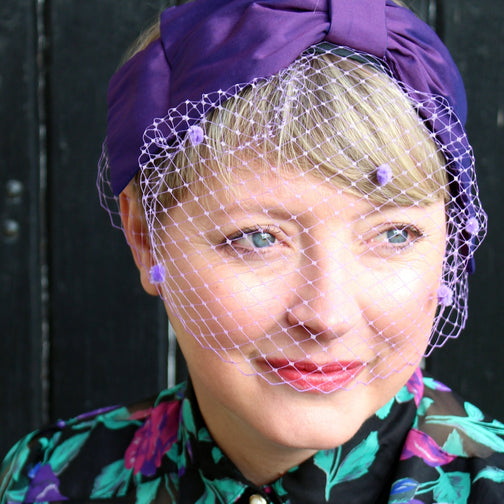 Purple taffeta Darling headpiece with birdcage veil