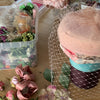 Powder pink Coquette pillbox hat with birdcage veil