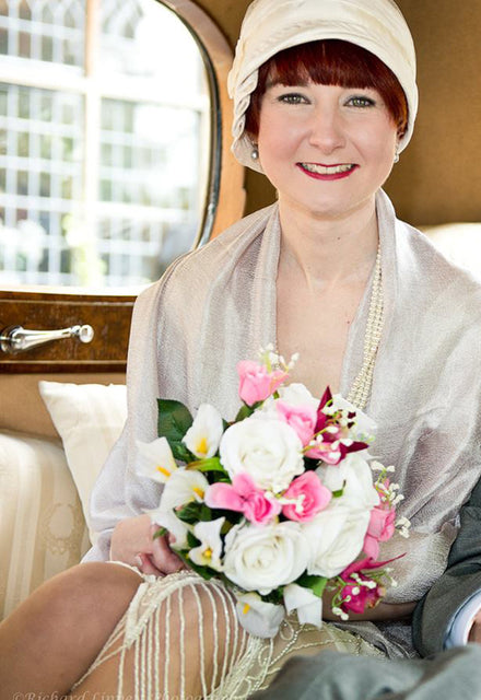 The bride wearing her 1920s Inès cloche hat