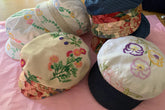 Anna Chocola Brighton Millinery hat made from embroidered cloth for fashion and textile Museum