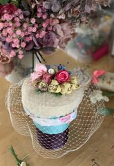 Yellow silk, ivory tulle and pastel coloured handmade flowers Coquette pillbox hat