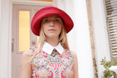 Anna Chocola waxed cotton rain hat for Beautiful People: The Boutique in 1960s Counterculture